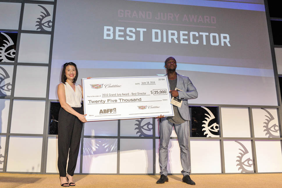 Qasim Basir takes home the $25,000 Grand Jury Prize for Best Director